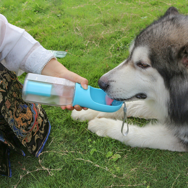 3-in-1 Leak-Proof Pet Water Bottle – Includes Food Feeder & Waste Bag Dispenser